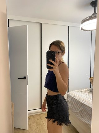 Pantalones cortos negros con flecos