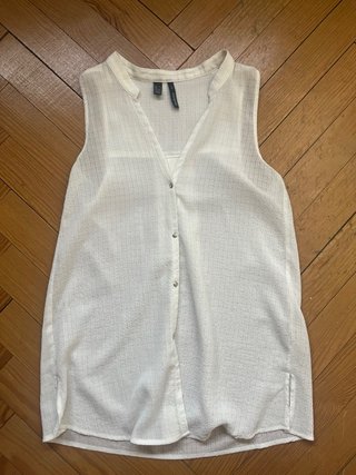 Camisa blanca sin mangas