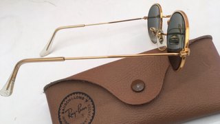 Gafas Ray-Ban Ovaladas Doradas.