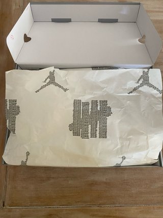 Air Jordan 4 Retro x Undefeated