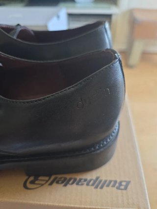 Zapatos de vestir negros con doble hebilla