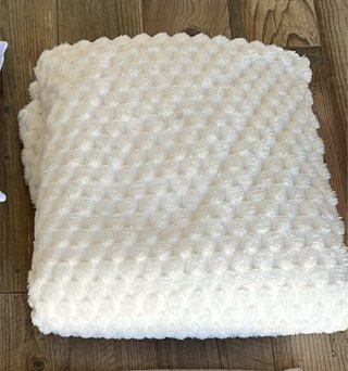 Manta blanca suave texturizada