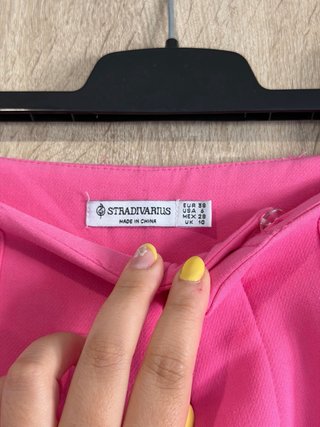 Pantalón de pinza rosa de mujer