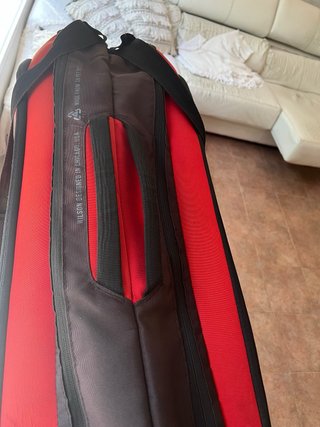 Raquetero Wilson Rojo, está usado...