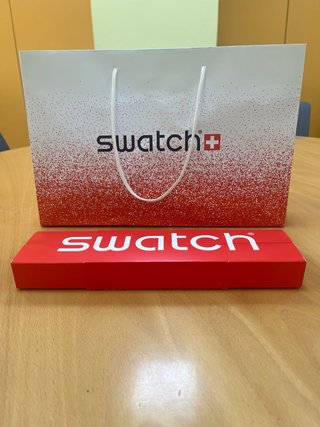 Reloj Swatch Blanco de mano