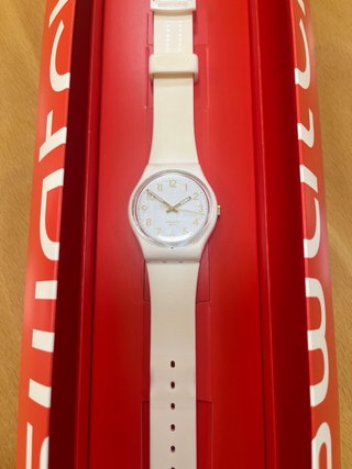 Reloj Swatch Blanco de mano