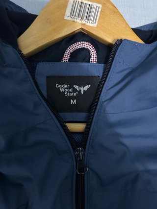 Cortavientos azul hombre