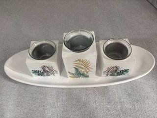 Centro de mesa decorativo con portavelas