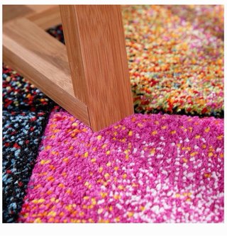 Alfombra multicolor de tela