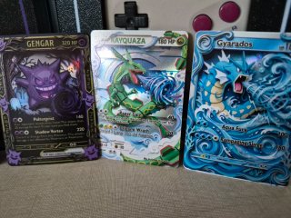 Cartas Pokémon Charizard, Pikachu, Gengar, Rayqua,