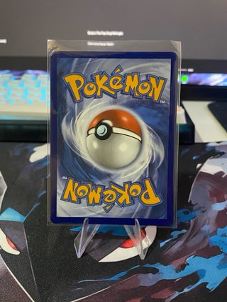 Carta Pokémon español Sliggoo AR (Caos Creciente)