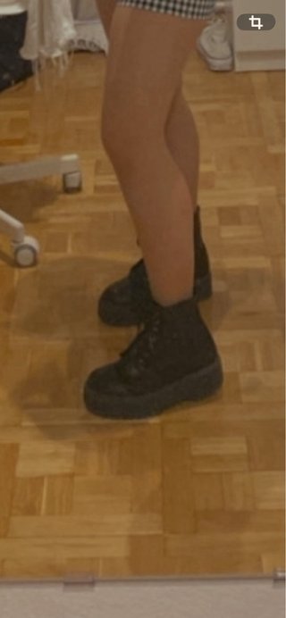 Botas negras con cremallera
