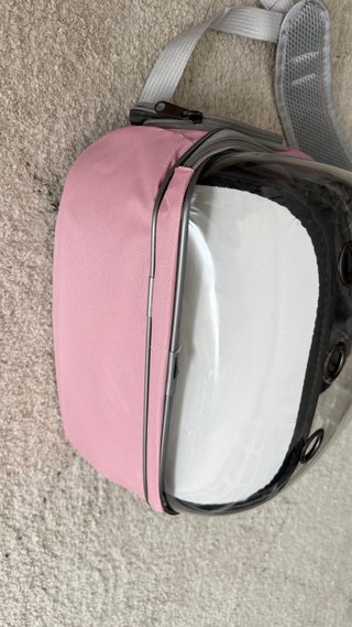 Transportín para gatos transparente y rosa