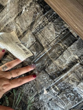 Cómoda cambiador blanca con detalles madera