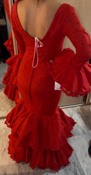 Traje de flamenca rojo volantes