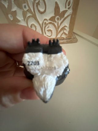 Figura pingüino con cría colección