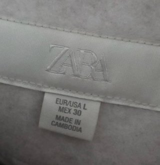 Chaqueta corta beige/gris mujer