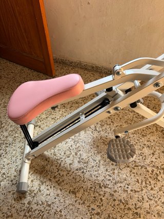 Máquina de sentadillas rosa