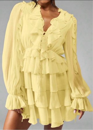 Vestido amarillo mini con volantes de manga larga