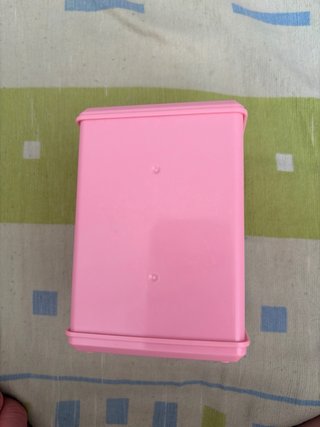 Hucha rosa con teclado numérico