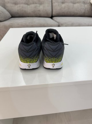 Zapatillas pádel niño Babolat grises y amarillas