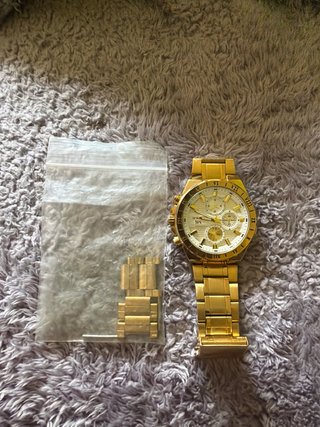 Reloj Dorado de Joyería