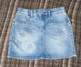 Falda vaquera con estrellas brillantes  talla 6-7