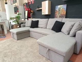 Sofá modular gris con chaise longue