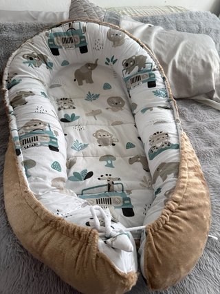 Nido para bebé con estampado de animales