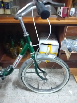 Bicicleta verde vintage plegable