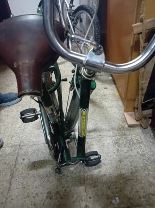 Bicicleta verde vintage plegable