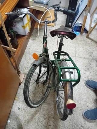Bicicleta verde vintage plegable