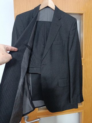 Traje de raya diplomática.