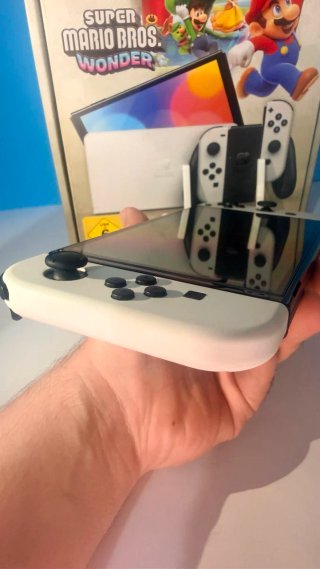 Nintendo Switch OLED con caja como nueva + juego