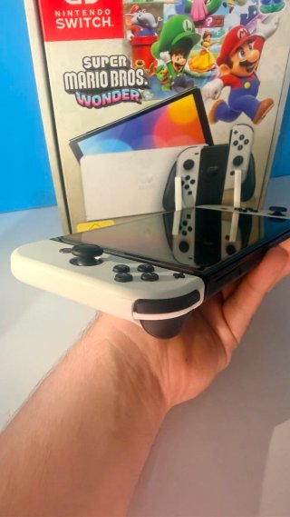 Nintendo Switch OLED con caja como nueva + juego