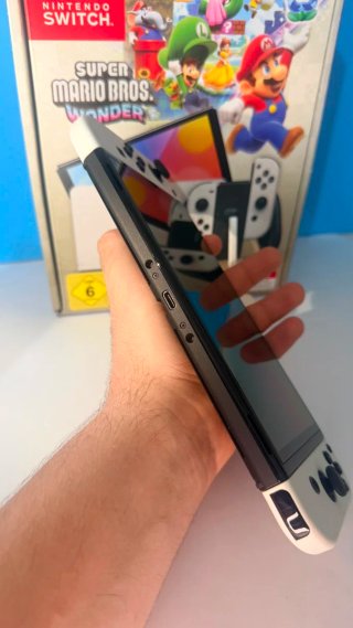 Nintendo Switch OLED con caja como nueva + juego