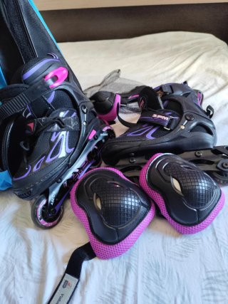 Patines y protecciones rosa/negro