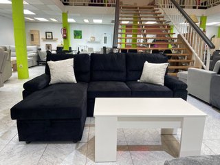 Conjunto de sofa cama negro y mesa elevable