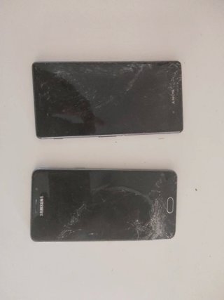 Tablet y 2 móviles rotos