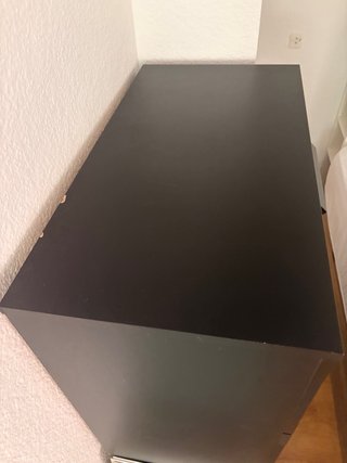 Cómoda negra 4 cajones con cristal Ikea