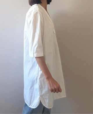 Blusa blanca bolsillos Uterqüe