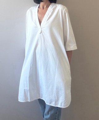 Blusa blanca bolsillos Uterqüe
