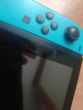 Nintendo Switch + Custodia + Controller + scheda SD 64g
