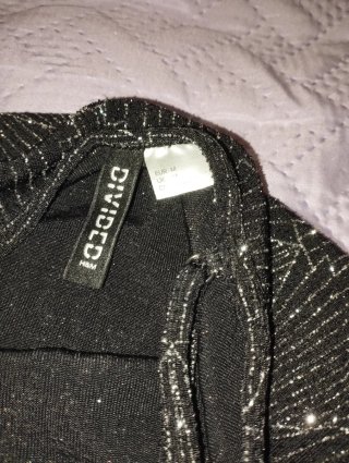Body brillante negro y plateado H&M