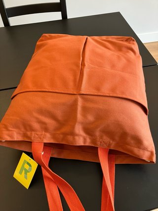 Bolsa de tela grande naranja con etiqueta