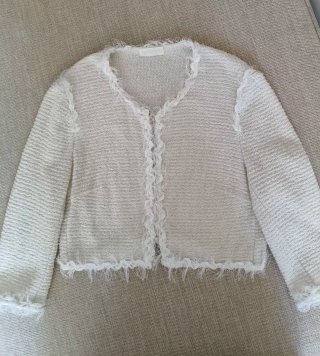 Chaqueta corta de punto con hilo plateado