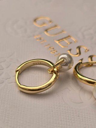 Pendientes dorados con perla