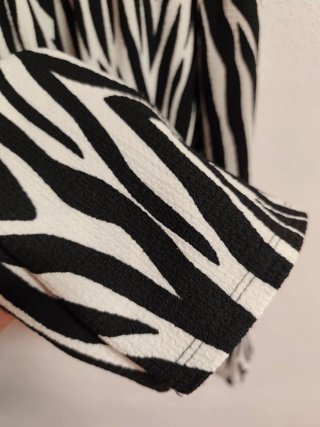 Vestido estampado de chica talla M-L de Primark.