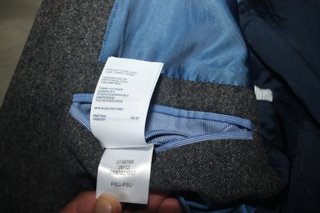 Americana Tommy Hilfiger. Lana gris, talla 48