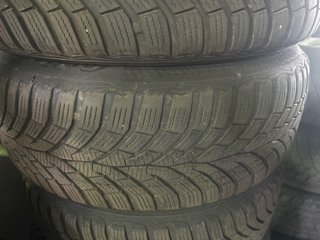 4 Neumáticos 195/55R16 87H con Tapacubos BMW